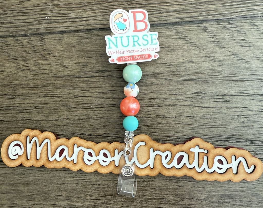 OB Nurse We help people get out of tight spaces Badge Reel