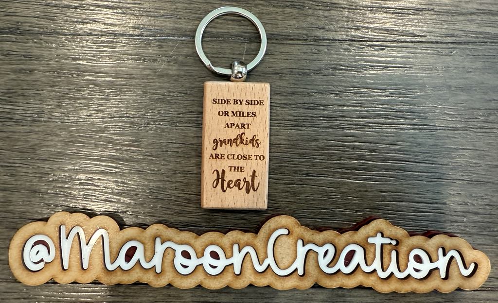 Side by side or miles apart Grandkids are close to the Heart Keychain