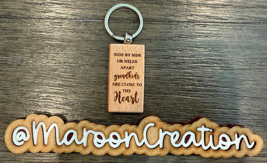 Side by side or miles apart Grandkids are close to the Heart Keychain