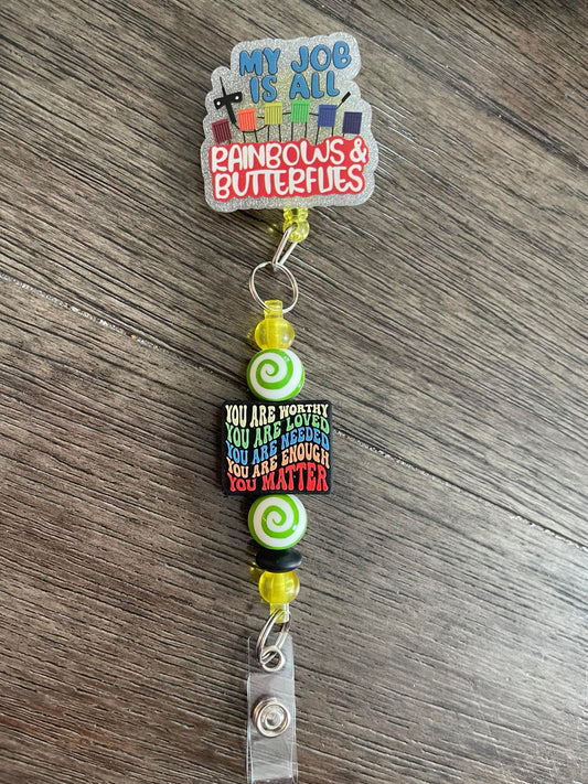 My job is all Rainbows & Butterflies Badge Reel