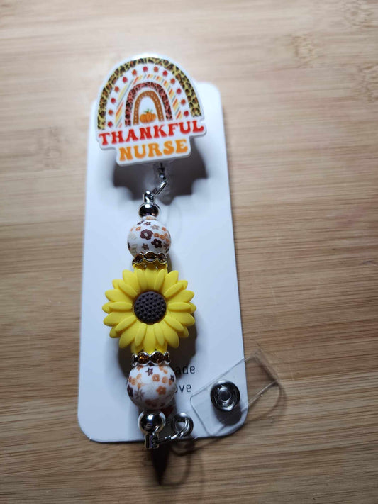 Thankful Nurse w sunflower Badge Reel