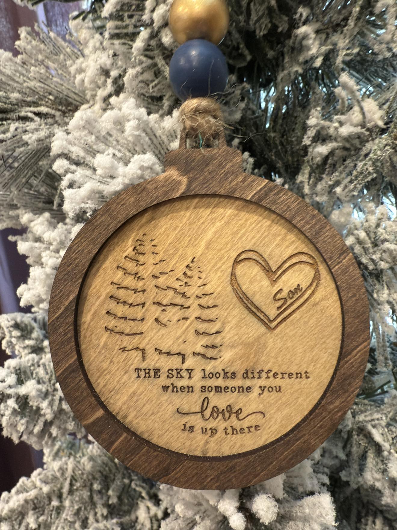 The sky looks different when someone you love is up there Personalized Remembrance Ornament