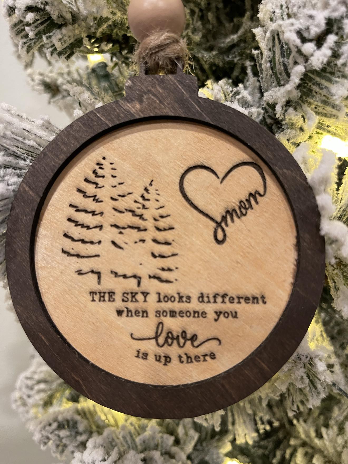 The sky looks different when someone you love is up there Personalized Remembrance Ornament