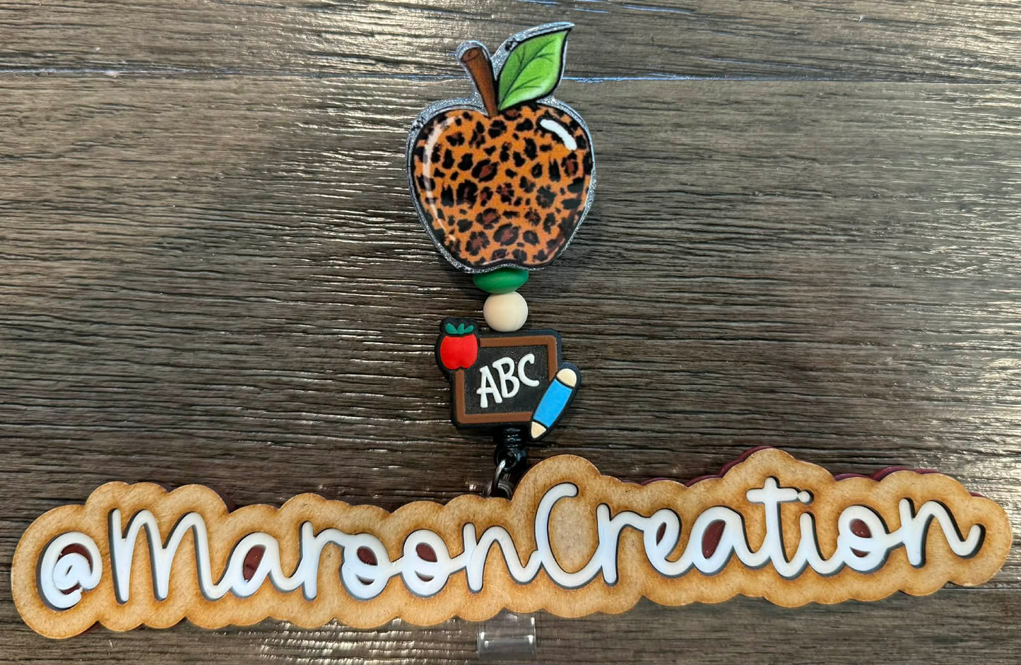 Leopard Apple Badge Reel